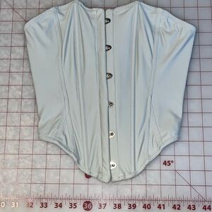 Urban outfitters grey corset top with button up front and tie back. Size small